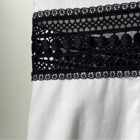 ALICE + OLIVIA | REVOLVE SAKS RAPUNZEL FLOUNCE MINI DRESS WHITE CROCHET ACCENT - Picture 6 of 7